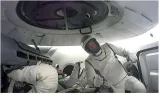 Billionaire steps out of spacex capsule for first private spacewalk