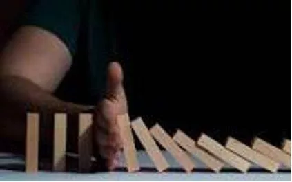 Inhibiting - To prevent something or make something happen more slowly.