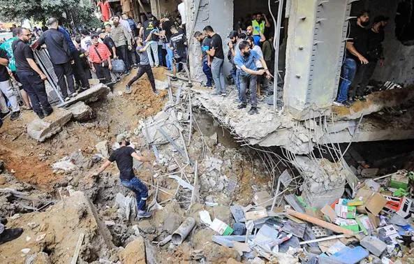After rocket attacks  israel targets hezbollah official in beirut strike