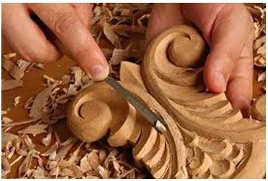 Carved - An object or design carved from a hard material as an artistic work. (नक्काशी)