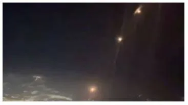 Chilling video from british airways flight's cockpit shows iran's missiles flying over israel
