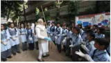 10 years of swachh bharat  pm modi picks up the broom for cleanliness drive with 'young friends'