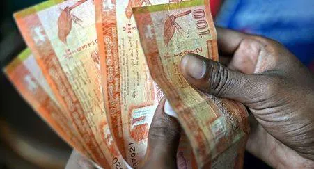 Sri lanka approves controversial foreign debt deal sought by imf