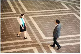 Hovers - To stand somewhere, especially near another person, eagerly or nervously waiting for their attention. (मंडराना) 