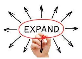 Expanded - To become or to make something bigger.