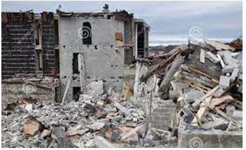 Crumbling - Break or fall apart into small fragments, especially as part of a process of deterioration.