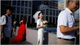 China's marriage registrations fall by almost a million in 2024