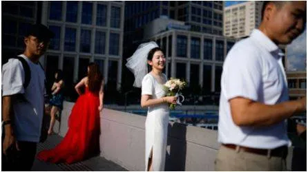 China's marriage registrations fall by almost a million in 2024