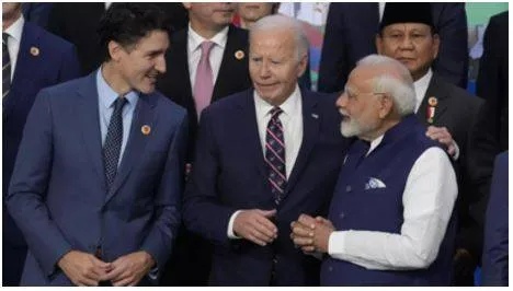 At g20 summit  pm modi and justin trudeau stand in the same frame  see pic 