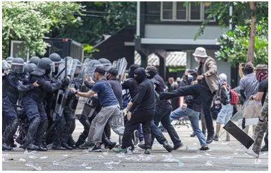 Insurgent - A person who rises in active revolt, typically against an established government or authority. (विद्रोही)