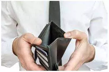 Strapped - Short of money. (तंगी) 