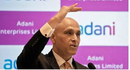 Adani group finance chief rejects bribery allegations