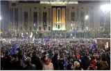 Georgian protesters rally on second night after suspension of eu talks