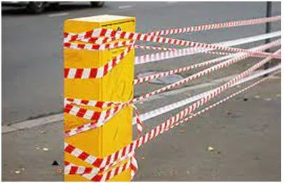 Cordoned - Prevent access to or from an area or building by surrounding it with police or other guards. (घेराबंदी)