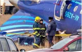 Azerbaijan mourns crash victims as speculation mounts about cause 