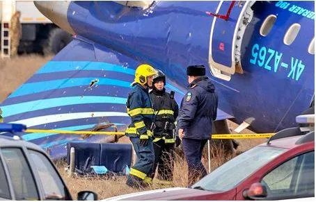 Azerbaijan mourns crash victims as speculation mounts about cause 