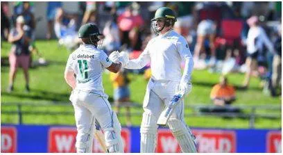 Rickelton  bavuma tons help south africa take opening day’s honours