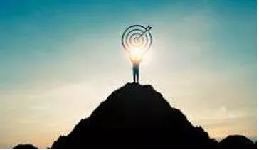 Achieving - To succeed in finishing something or reaching an aim, especially after a lot of work or effort. (हासिल करना) 