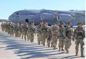 Deployed - To put soldiers or weapons in a position where they are ready to fight. (तैनात करना) 