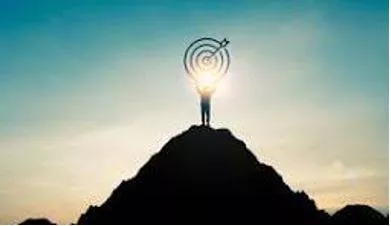 Achieving - To succeed in finishing something or reaching an aim, especially after a lot of work or effort. (हासिल करना)