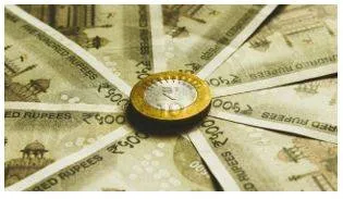 In calibrated move  rbi loosens grip  lets rupee depreciate against us dollar