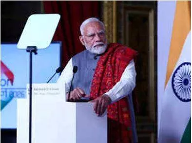 Paris ai summit  pm modi urges democratising tech  says 'ai writing code for humanity'