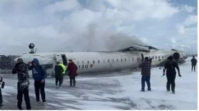 At least 18 injured after delta airlines plane crash lands at canada airport  flips upside down