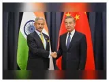 Eam jaishankar meets chinese fm wang on sidelines of g20 foreign ministers meeting in johannesburg