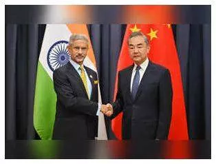 Eam jaishankar meets chinese fm wang on sidelines of g20 foreign ministers meeting in johannesburg