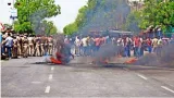 Protest in jaipur over temple vandalism  mob tries to set petrol pump on fire  suspect arrested