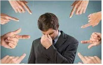 Accusing - A person or group of people who are charged with or on trial for a crime.