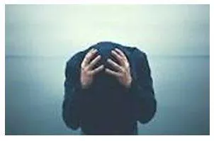 Desperately - Feeling or showing a hopeless sense that a situation is so bad as to be impossible to deal with.