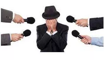 Exposes - Make (something) visible by uncovering it.