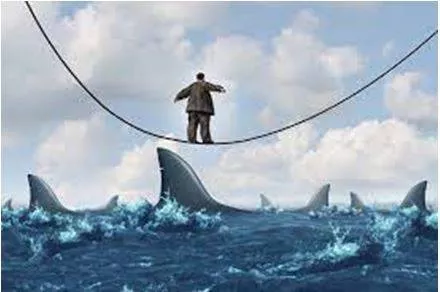 Vulnerable - Exposed to the possibility of being attacked or harmed, either physically or emotionally. (असुरक्षित)
