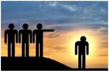 Exile - The condition of someone being sent or kept away from their own country, village, etc., especially for political reasons. (निर्वासित)