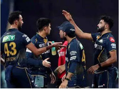 Gujarat titans defeat mumbai indians by 3 wickets in a rain curtailed last ball thriller