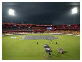 Rcb move to top  kkr eliminated as rain ruins ipl comeback in bengaluru