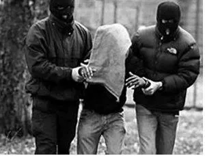 Abduction - The action of forcibly taking someone away against their will, typically to hold them captive.