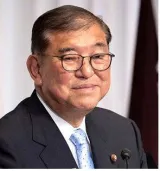 Ishiba to stay on as japan pm despite loss in house polls