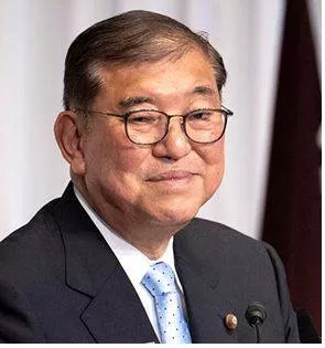 Ishiba to stay on as japan pm despite loss in house polls