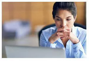 Concerned - Worried, troubled, or anxious about something. (चिंतित)
