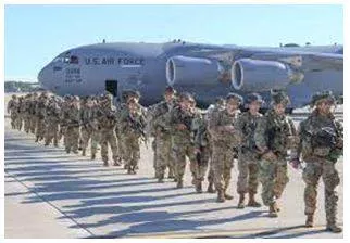 Deployed - To put soldiers or weapons in a position where they are ready to fight. (तैनात करना) 