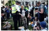U k  arrests 365 for backing banned pro palestine group