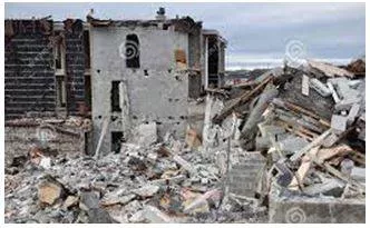 Crumbling - Break or fall apart into small fragments, especially as part of a process of deterioration. (टुकड़े करना) 