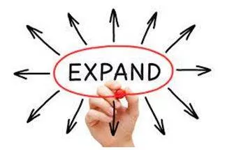Expanding - To become or to make something bigger. (फैलना या फैलाना) 