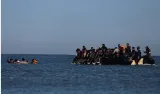 U k  deports first migrant to france under new deal