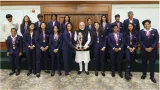 Pm modi felicitates women s world cup champions at his residence in new delhi