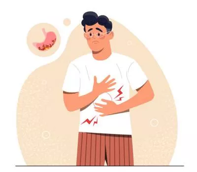 Dyspeptic - Relating to indigestion; irritable or bad-tempered.