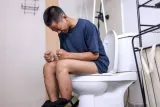 ‘What are the signs of severe constipation that require medical treatment? Are there any potential complications associated with it?’