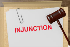 Injunction - An authoritative warning or order.
